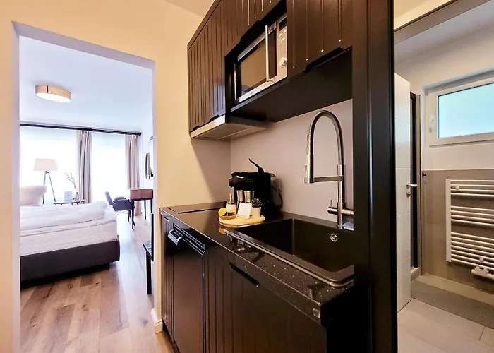 Moderne 1 Zimmer Ferienwohnung Im Landhaus Haffkrug Mit Terrasse, Gartenblick Und Parkplatz In Ruhiger Lage